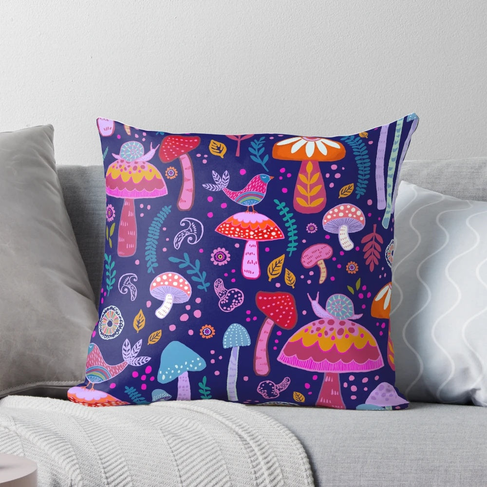 Vibrant navy pillow featuring whimsical mushroom and nature-themed design