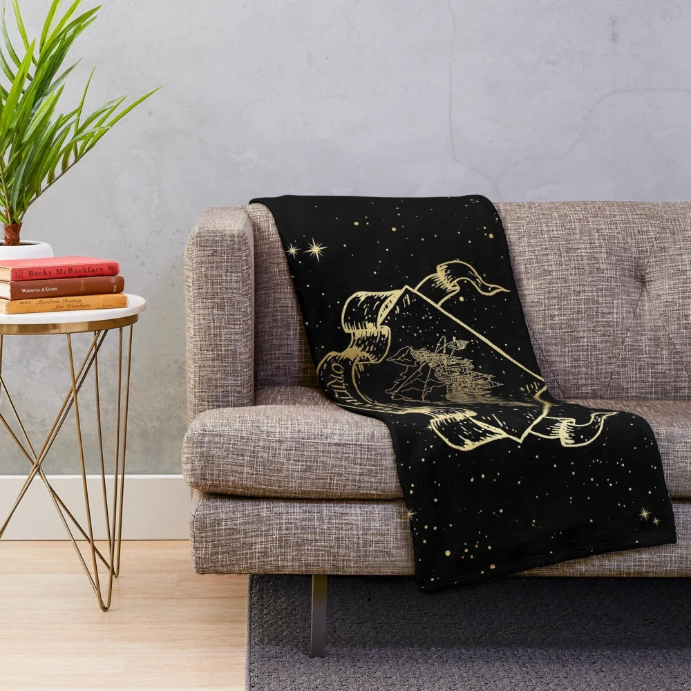 Orilium-inspired plush black blanket for cozy reading