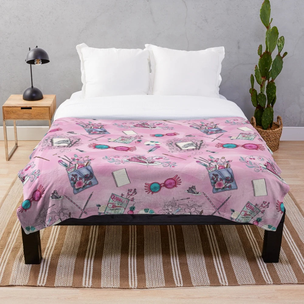 Soft and cozy plush blanket with a whimsical Luna Lovegood-inspired design