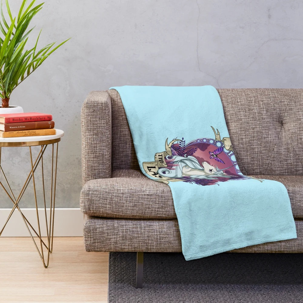 Cozy unicorn plush blanket inspired by the classic fantasy film "The Last Unicorn