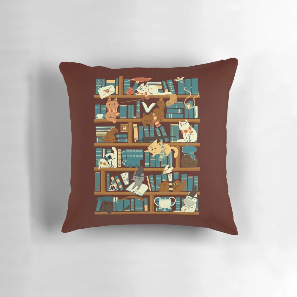 A cozy pillow featuring a whimsical library cat design, perfect for book-loving wizards and nerds.