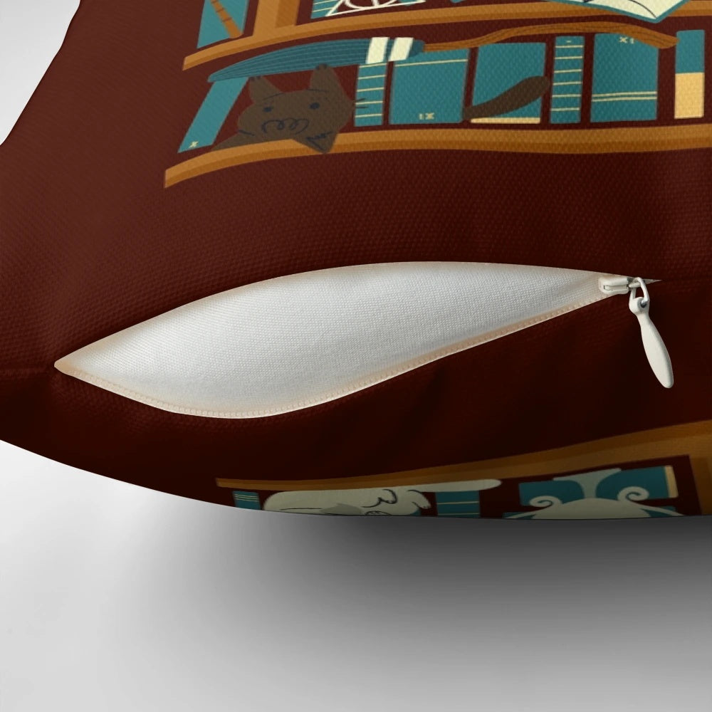 A cozy pillow featuring a whimsical library cat design, perfect for book-loving wizards and nerds.