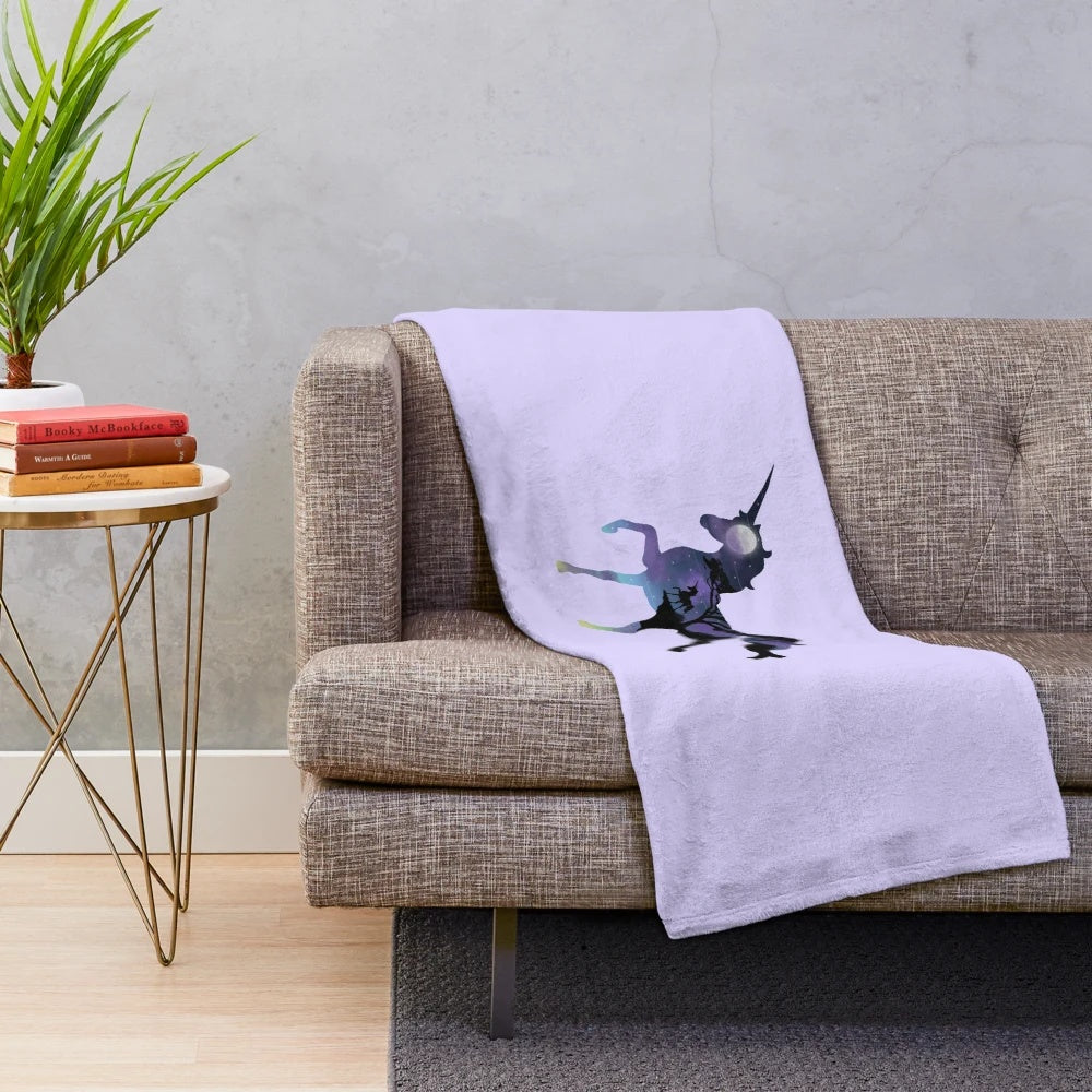 Soft and cozy unicorn plush blanket with a fantasy night sky landscape