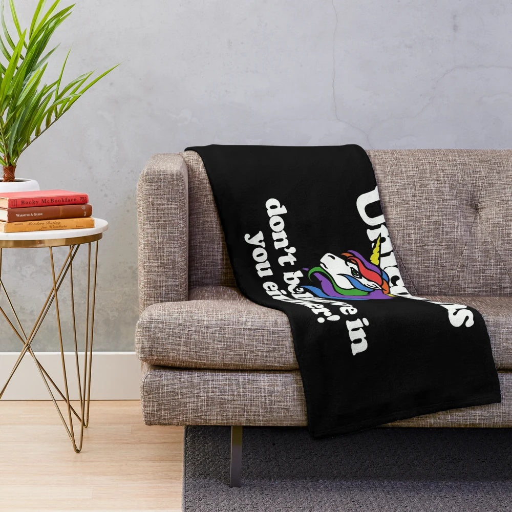 Cozy unicorn plush blanket with rainbow design