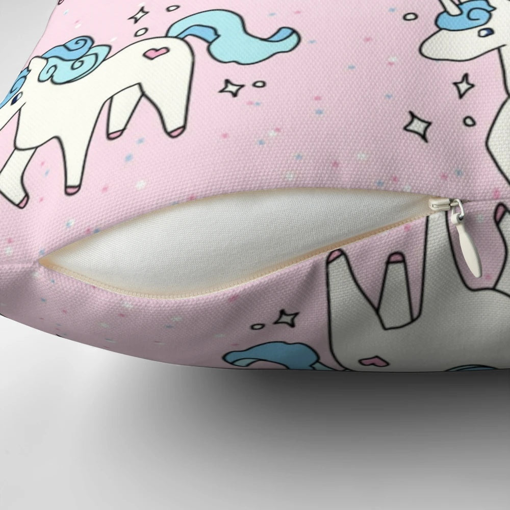 Soft, plush unicorn pattern pillow in pastel colors with a scattered design.