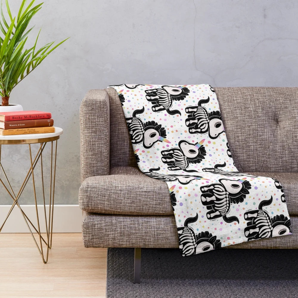 Unicorn skeleton plush blanket in pastel colors