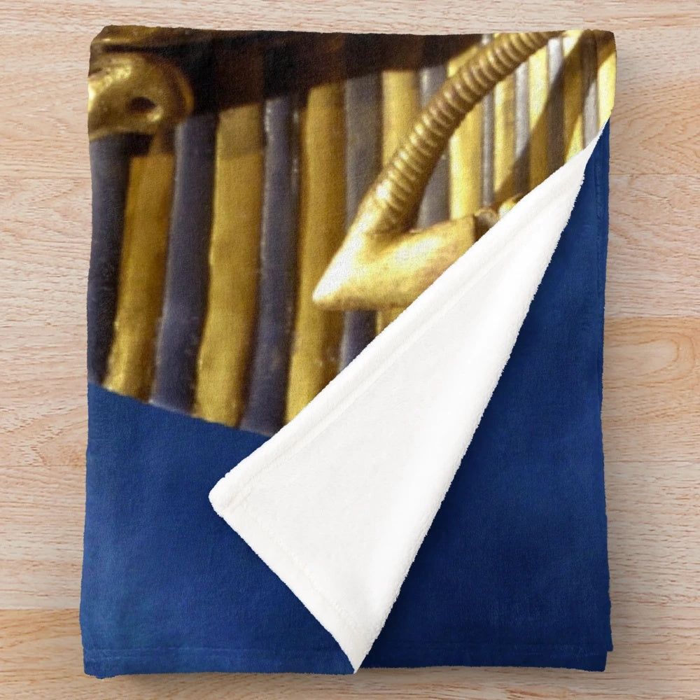 King Tut plush blanket with pyramid and night sky design