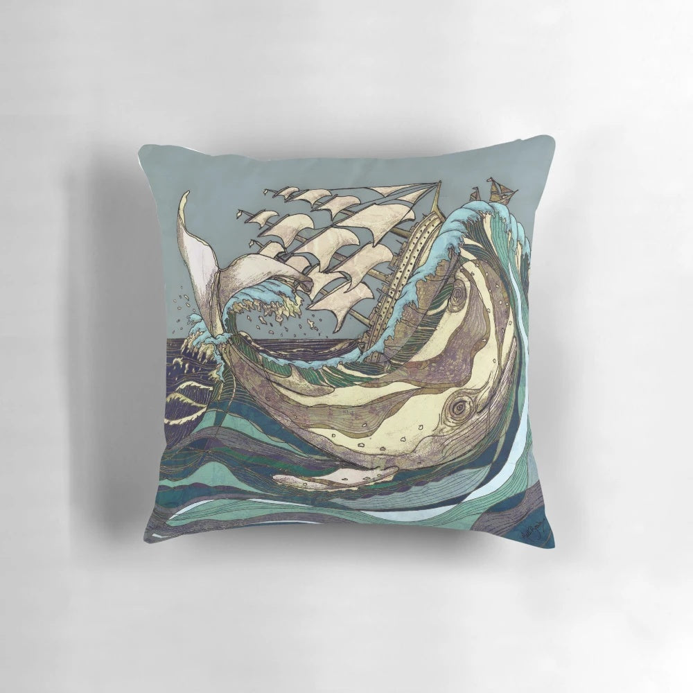 A decorative pillow featuring a whale, the sea, and a sailing ship, with a focus on the "leviathan" keyword.
