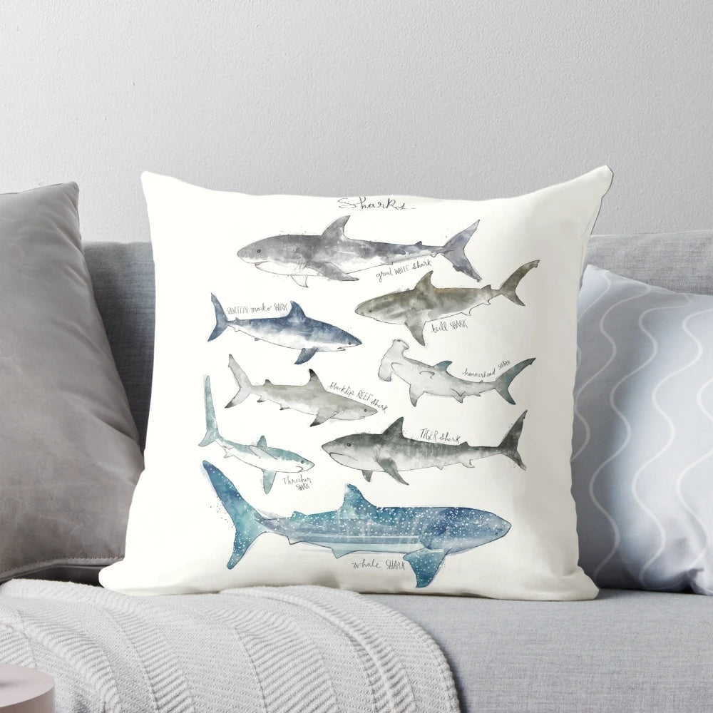 Decorative pillow featuring a stunning landscape illustration of sharks swimming in the ocean.