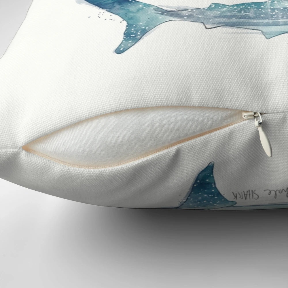 Decorative pillow featuring a stunning landscape illustration of sharks swimming in the ocean.