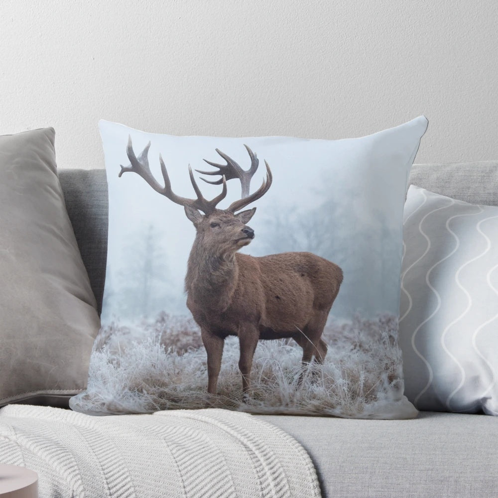 Decorative white pillow with a mystical monarch butterfly design, evoking the winter landscapes of the Scottish Highlands.