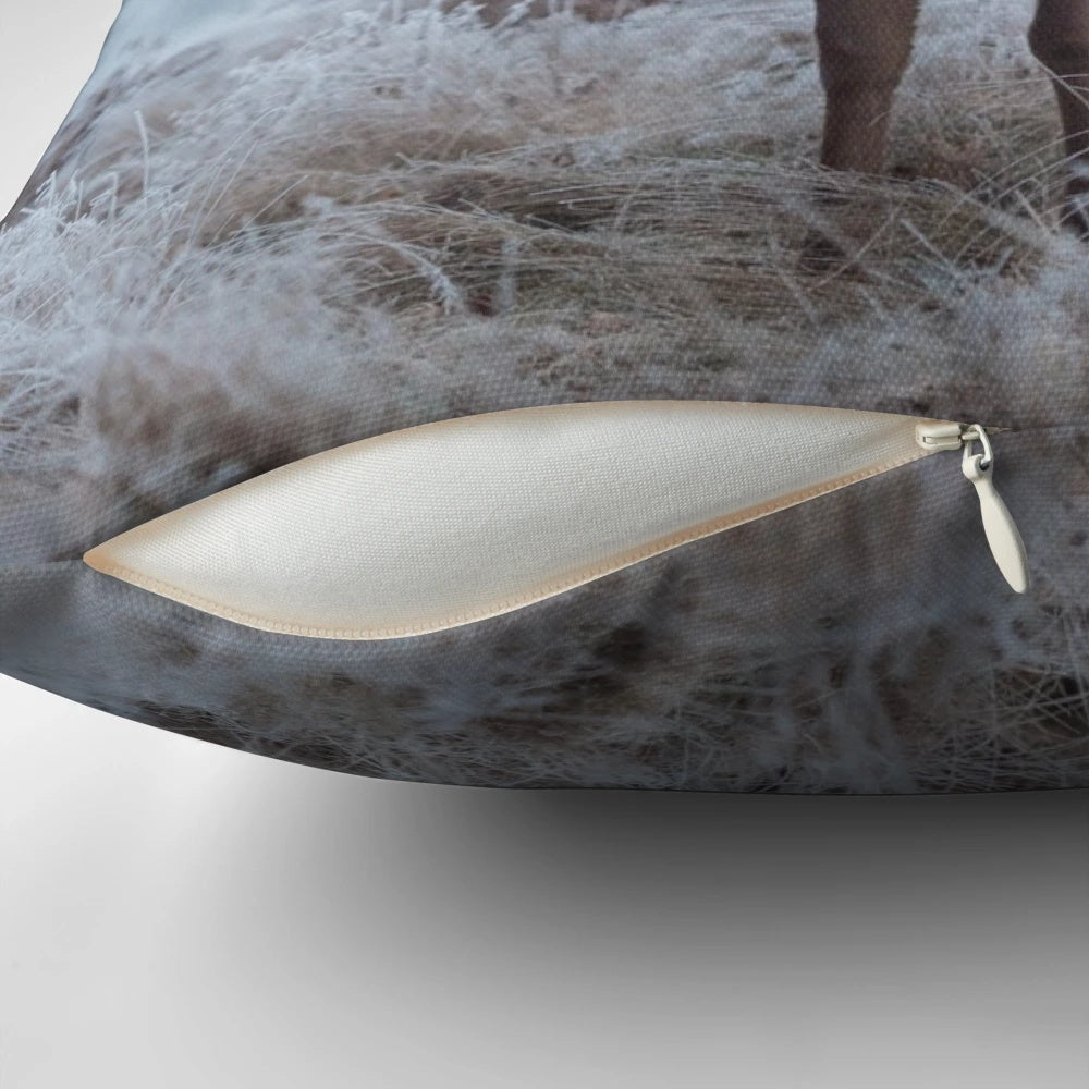 Decorative white pillow with a mystical monarch butterfly design, evoking the winter landscapes of the Scottish Highlands.