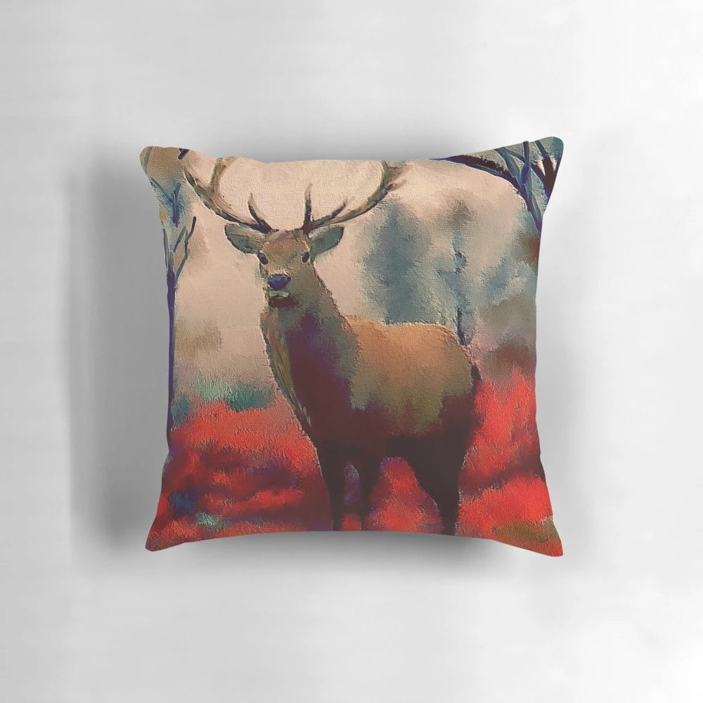 A vivid and unique pillow featuring a striking red stag in a lush forest setting.