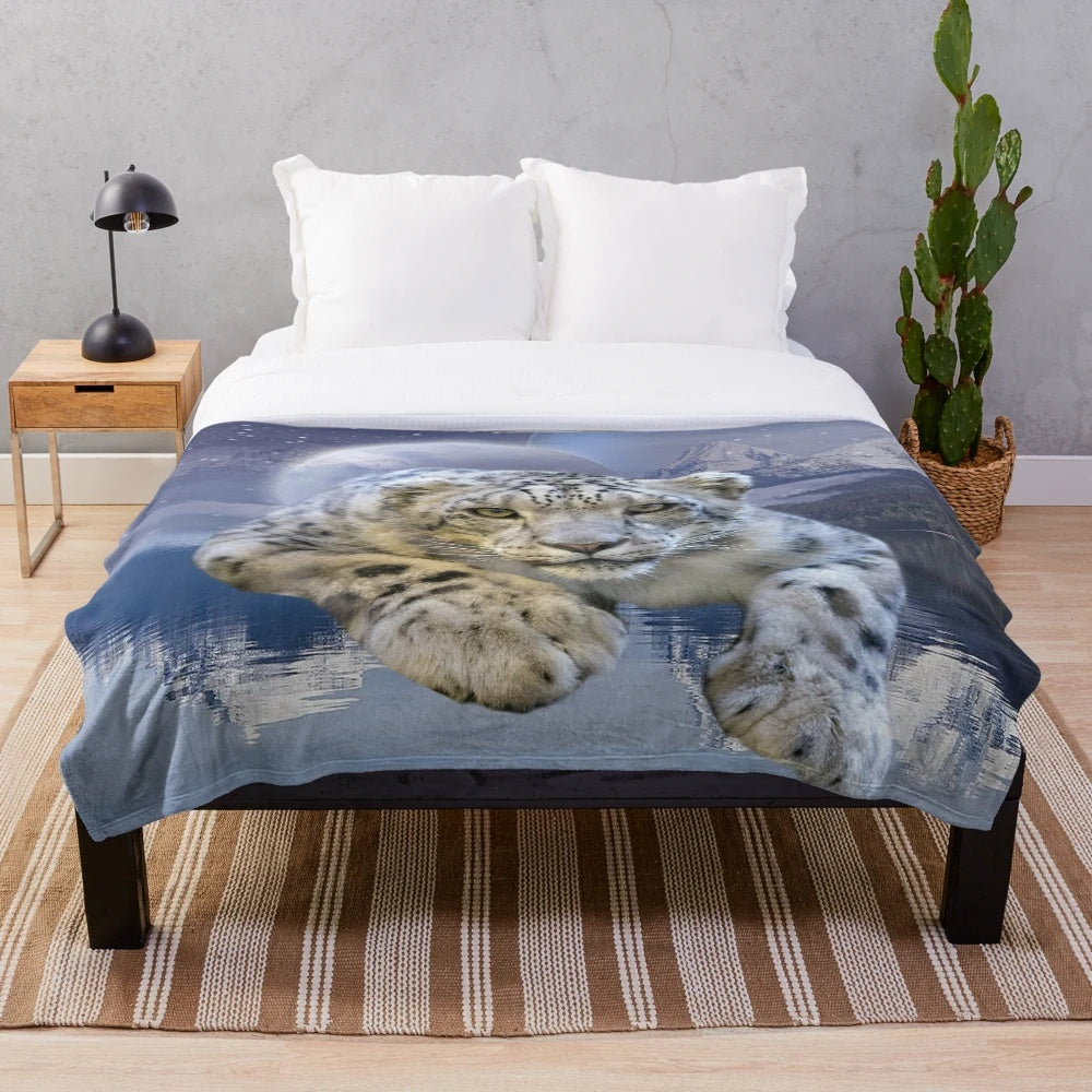 Snow leopard plush blanket with moon and stars design