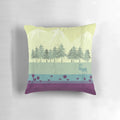 A vibrant, nature-inspired pillow featuring a deer against a backdrop of forests, mountains, and a gradient of colors
