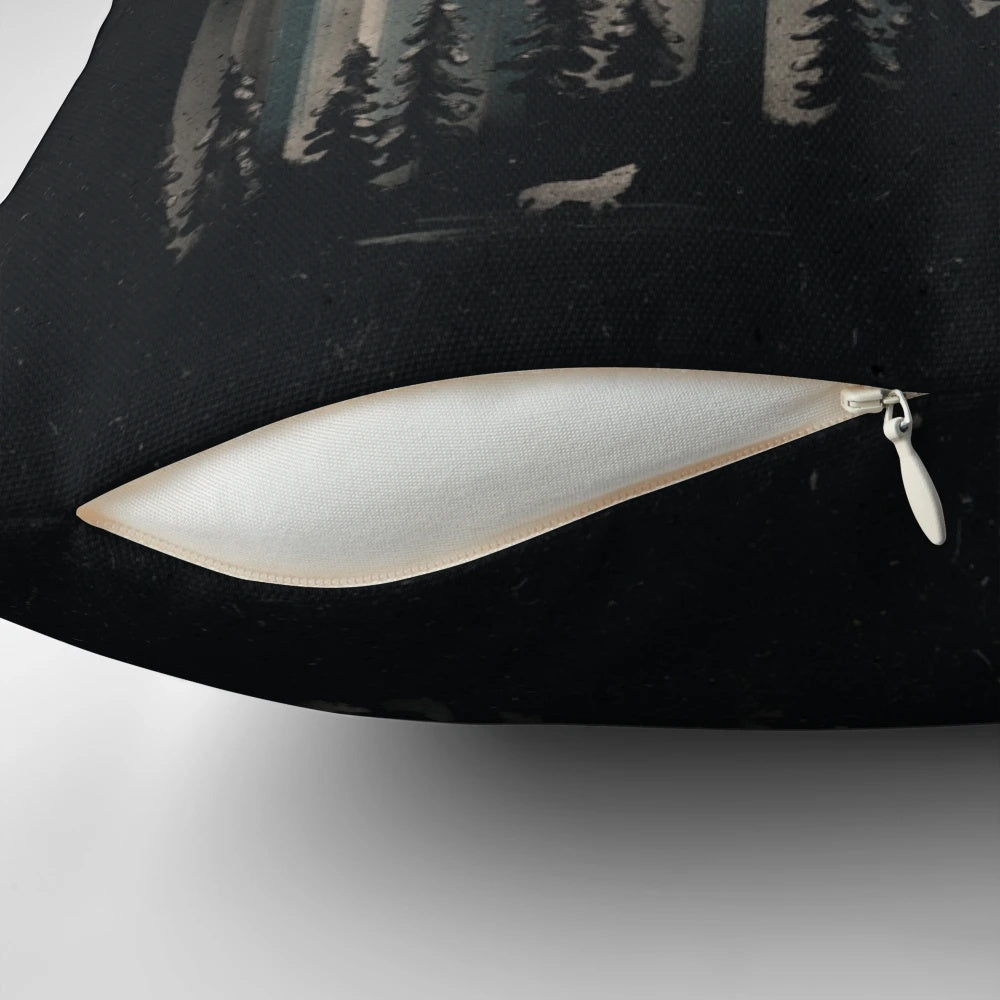 A Pillow featuring a Majestic Wolf Prowling the Moonlit Mountains