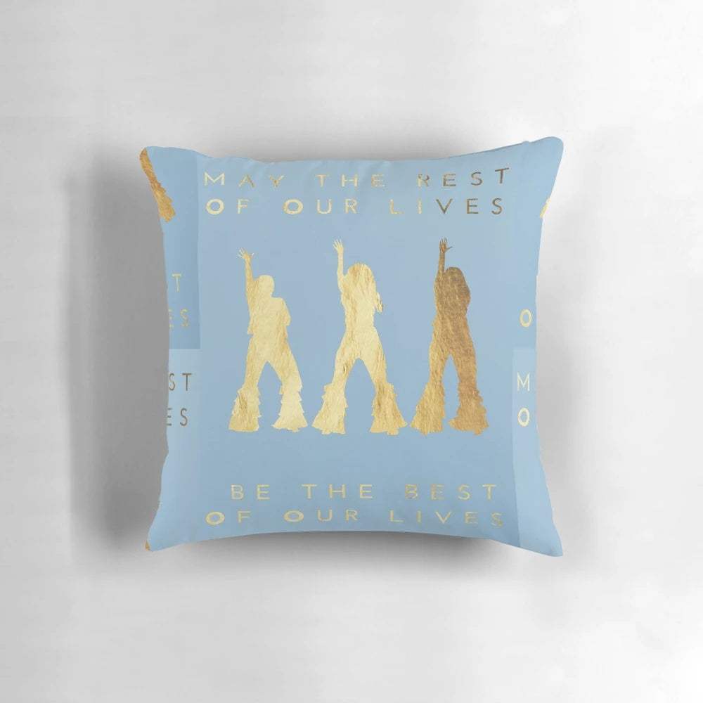 A golden foil-accented pillow featuring the iconic characters from the Mamma Mia musical and films.