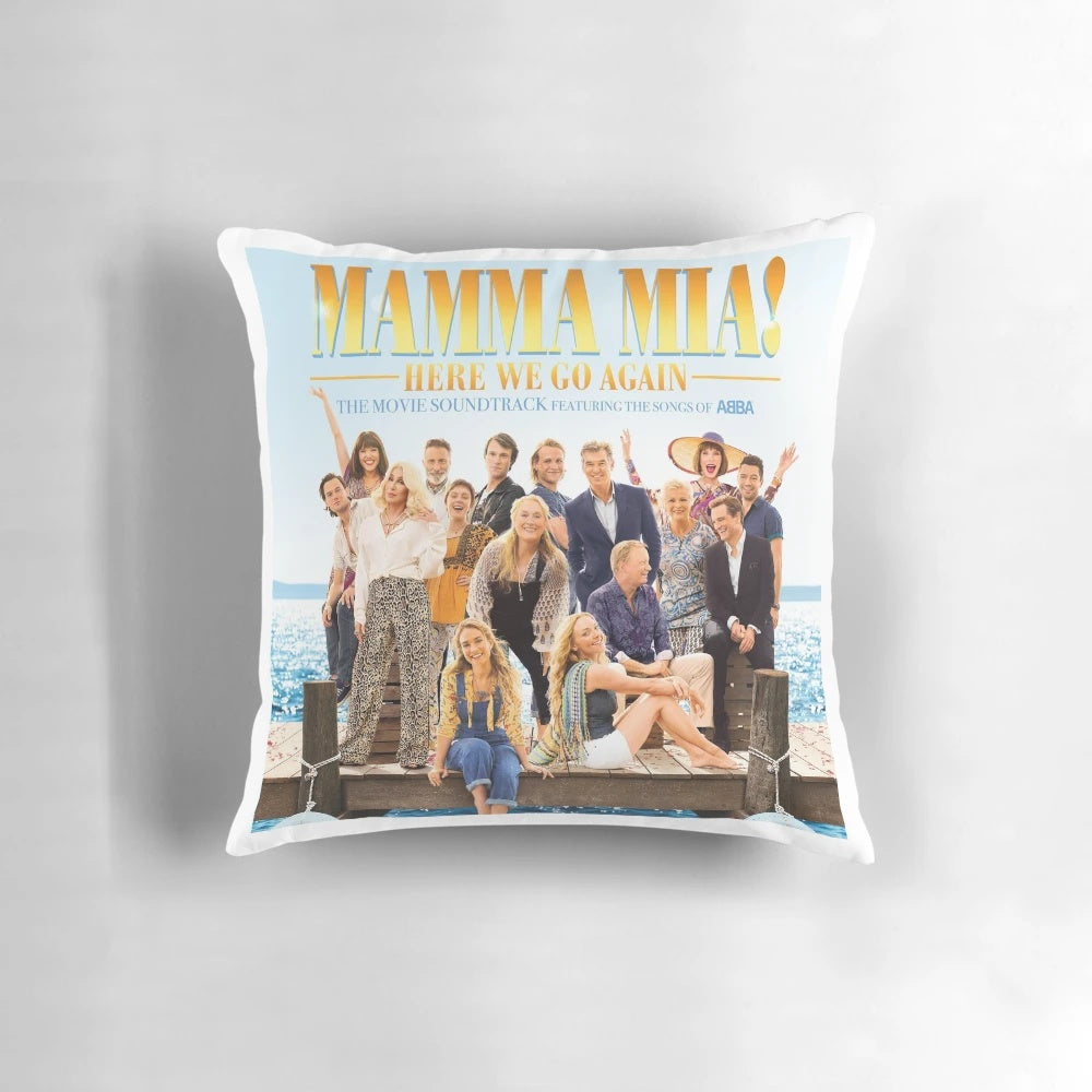 Vibrant Mamma Mia-themed pillow featuring iconic theater masks and musical notes