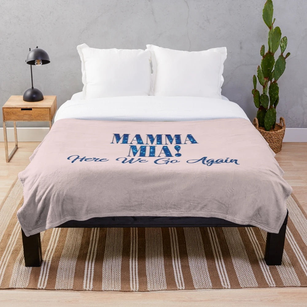 Mamma Mia-themed plush blanket featuring characters and songs from the beloved musical and film