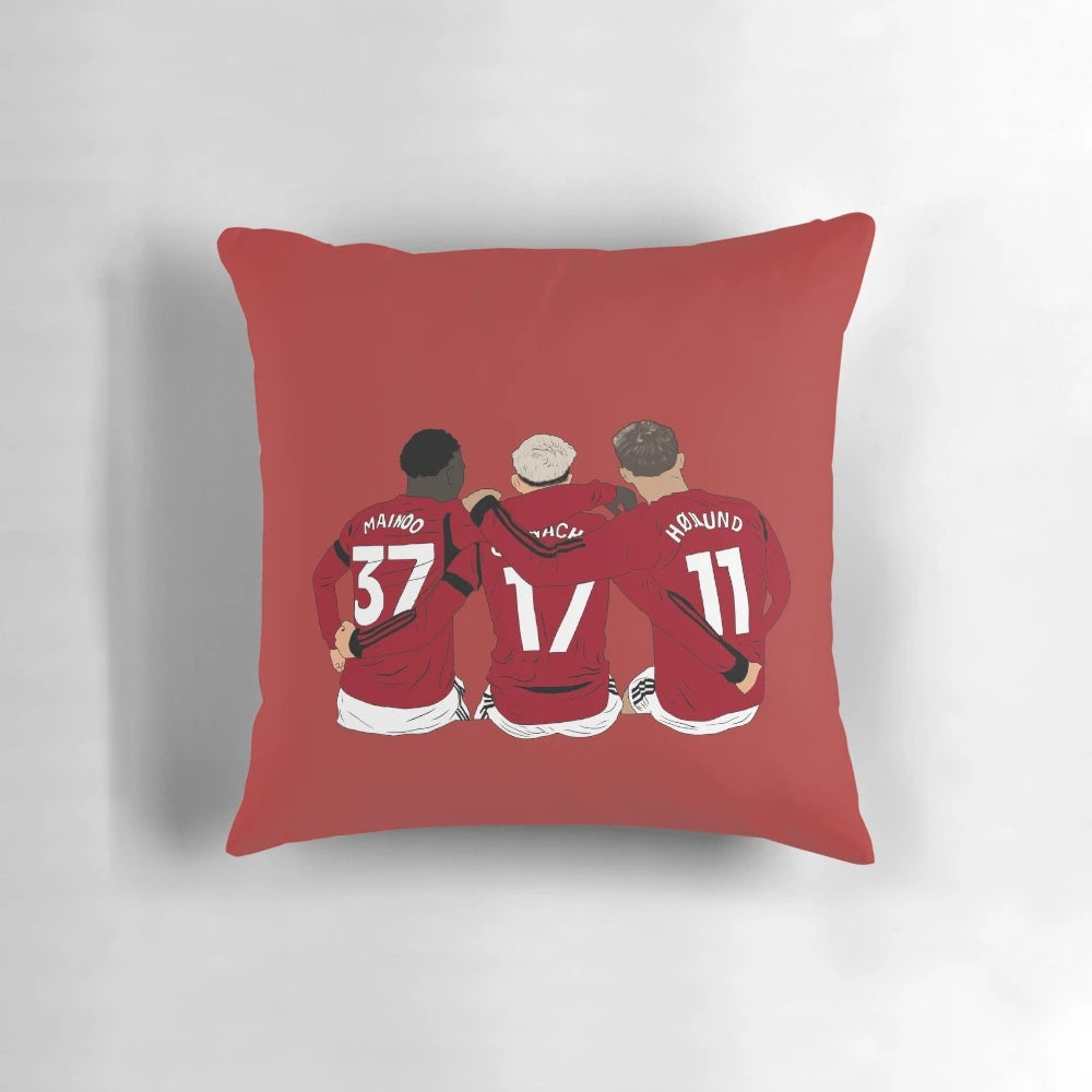 Minimalist pillow featuring Manchester United youth players Kobbie Mainoo, Alejandro Garnacho, and Rasmus Højlund