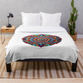 Mandala art inspired plush blanket with intricate patterns