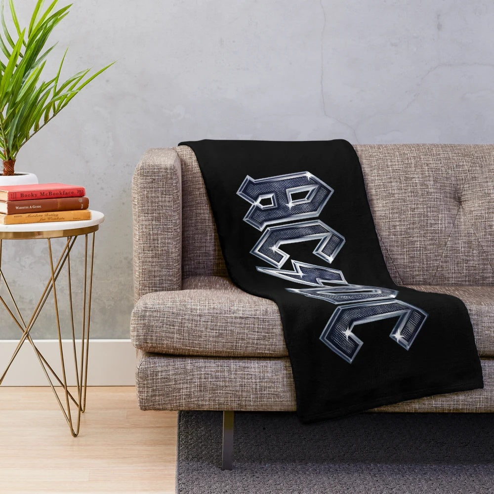 Marble-inspired plush blanket with ACDC music band graphics