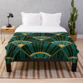 Marbled geometric pattern plush blanket in green, gold, and vintage art deco style