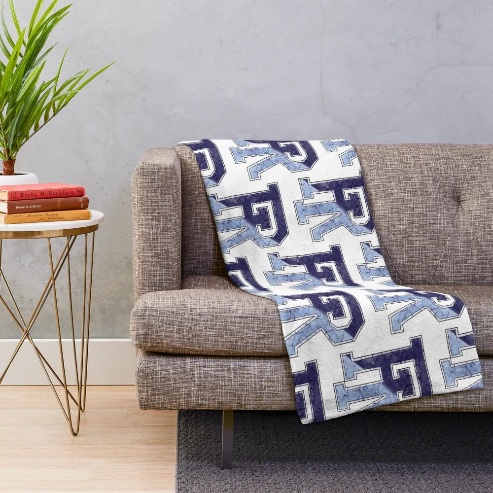 Marbled plush blanket featuring the University of Rhode Island Rhody Rams logo