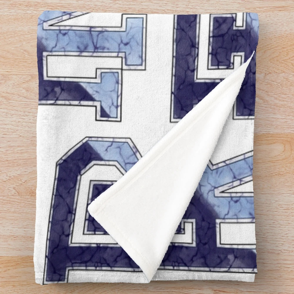 Marbled plush blanket featuring the University of Rhode Island Rhody Rams logo