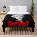 Marilyn Monroe portrait in black and white with red lips and roses