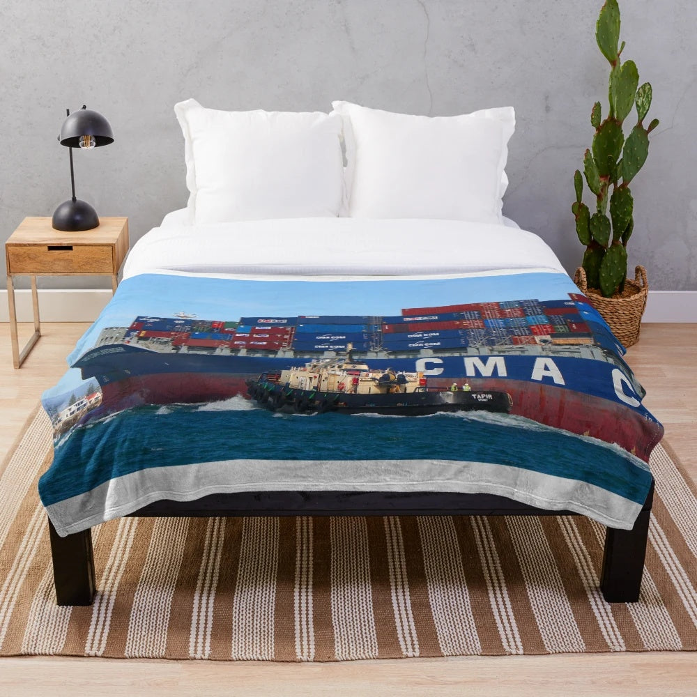 Plush blanket featuring a container cargo ship design