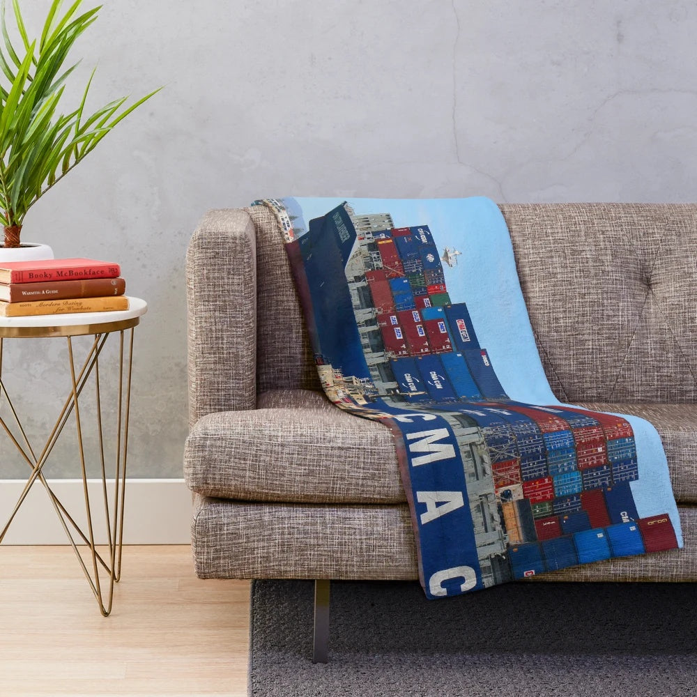 Plush blanket featuring a container cargo ship design