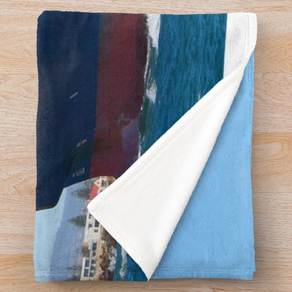 Plush blanket featuring a container cargo ship design