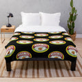Marmite logos plush blanket, featuring the iconic Marmite logo design
