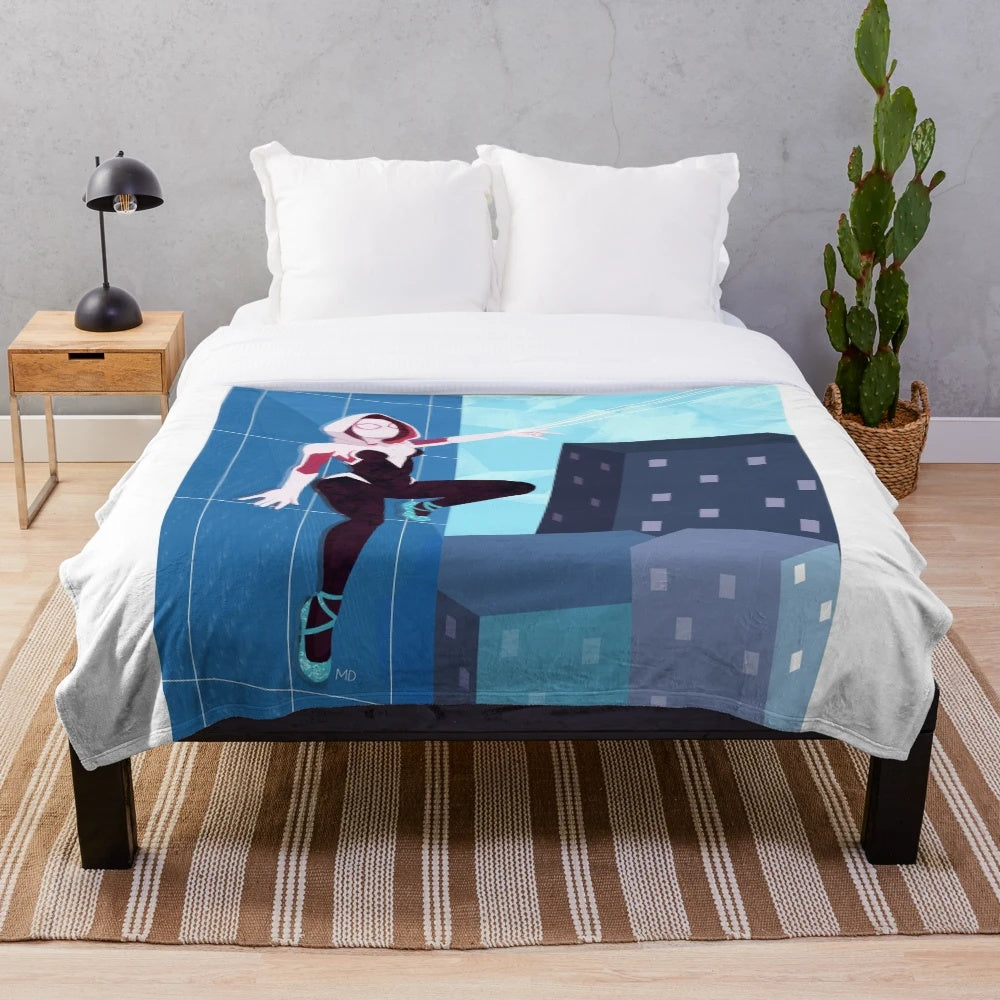 Spider-Gwen inspired plush blanket featuring the superhero girl in pink and blue colors with web design