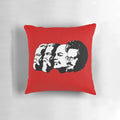 A throw pillow featuring portraits of Marx, Engels, Lenin, and Trotsky, key figures in Marxist and communist ideology.