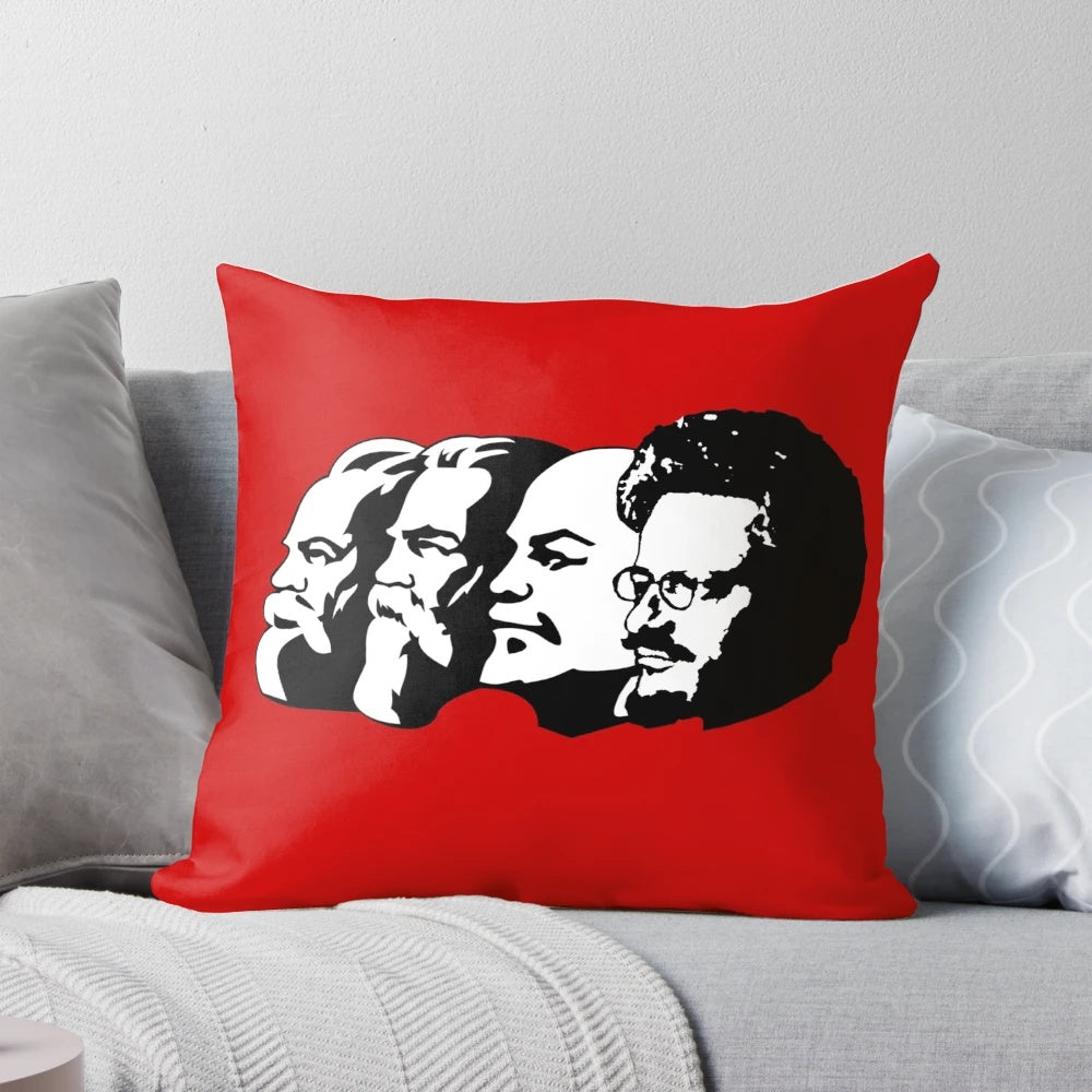 A throw pillow featuring portraits of Marx, Engels, Lenin, and Trotsky, key figures in Marxist and communist ideology.