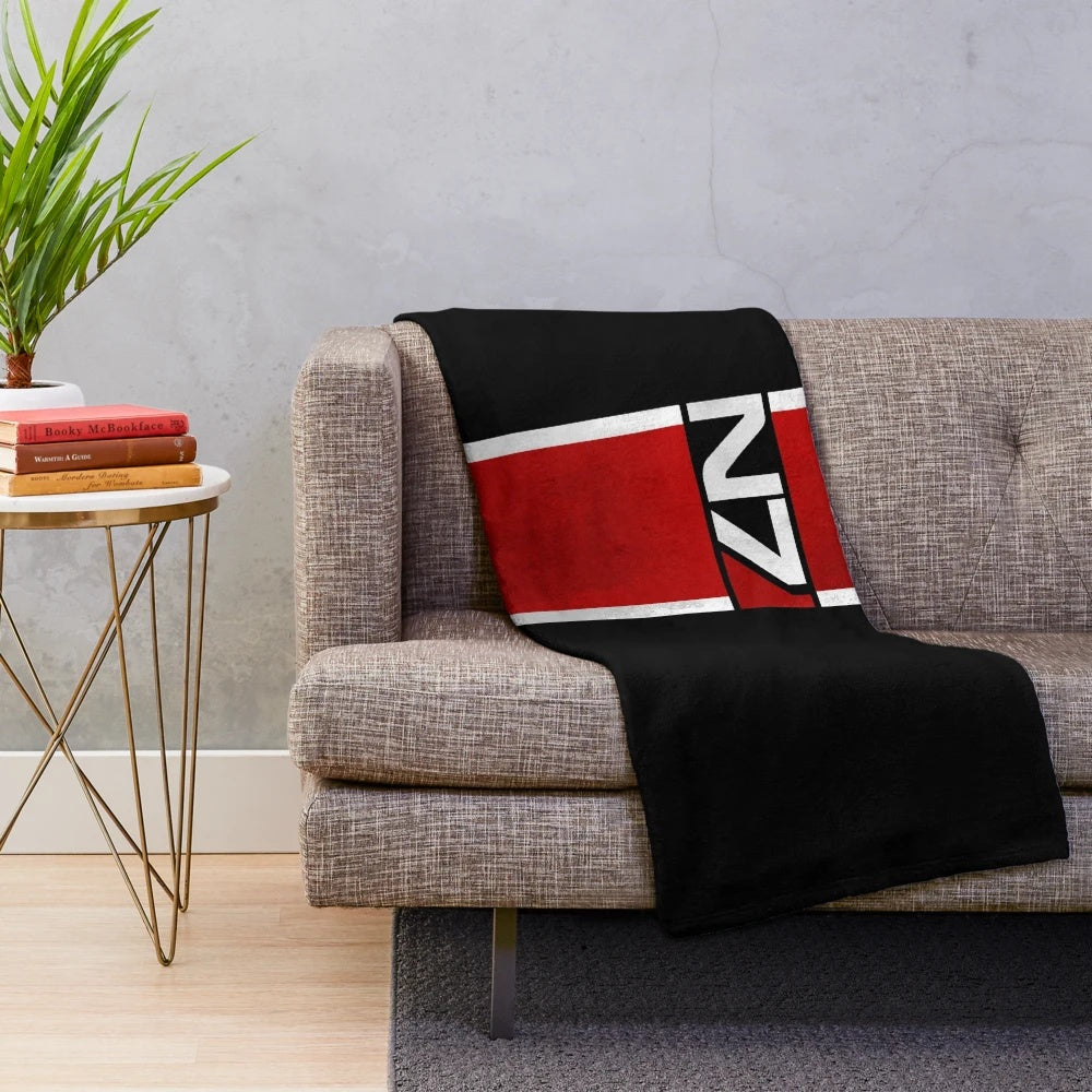 Mass Effect-inspired vertical N7 plush blanket with Commander Shepard design