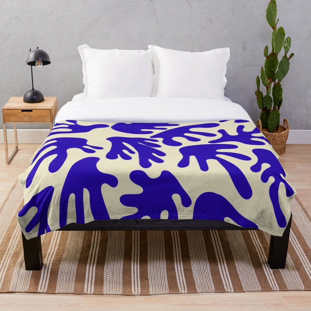 Classic blue plush blanket with Matisse-inspired abstract pattern