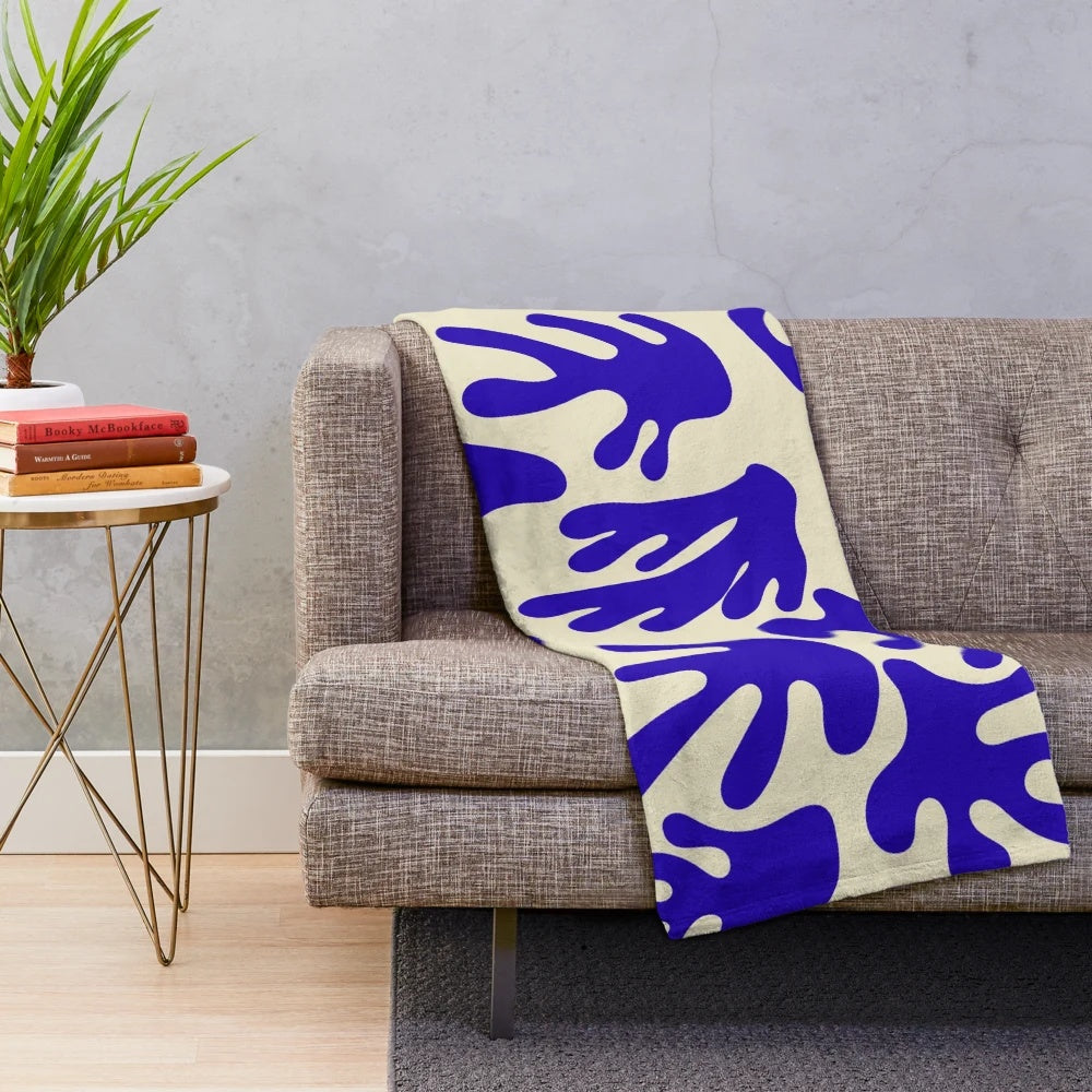 Classic blue plush blanket with Matisse-inspired abstract pattern