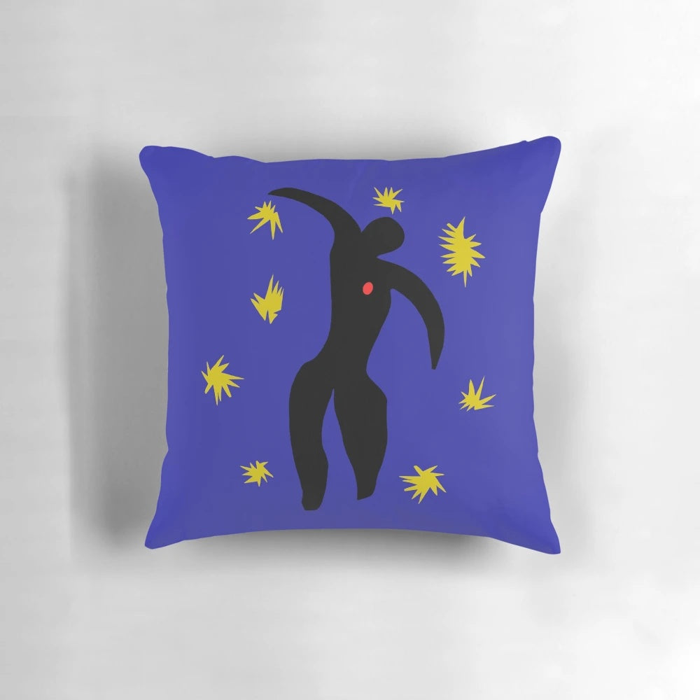 Matisse-style abstract paper collage design on a throw pillow in blue and white