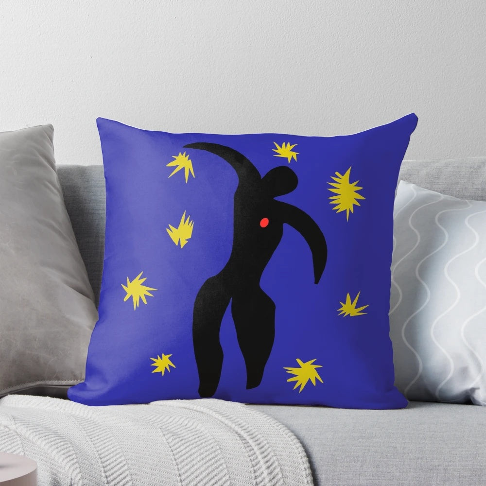 Matisse-style abstract paper collage design on a throw pillow in blue and white