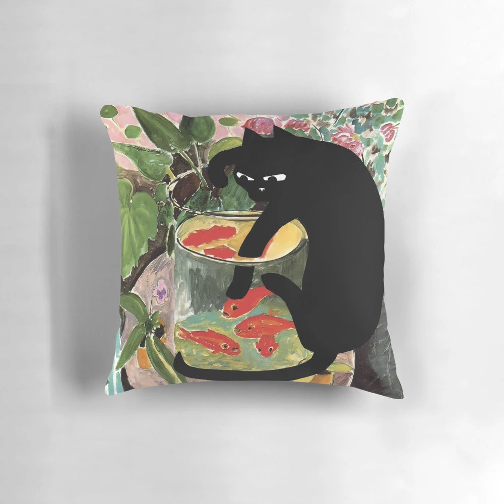 Colorful decorative pillow featuring Matisse's famous painting of goldfish and a mischievous black cat