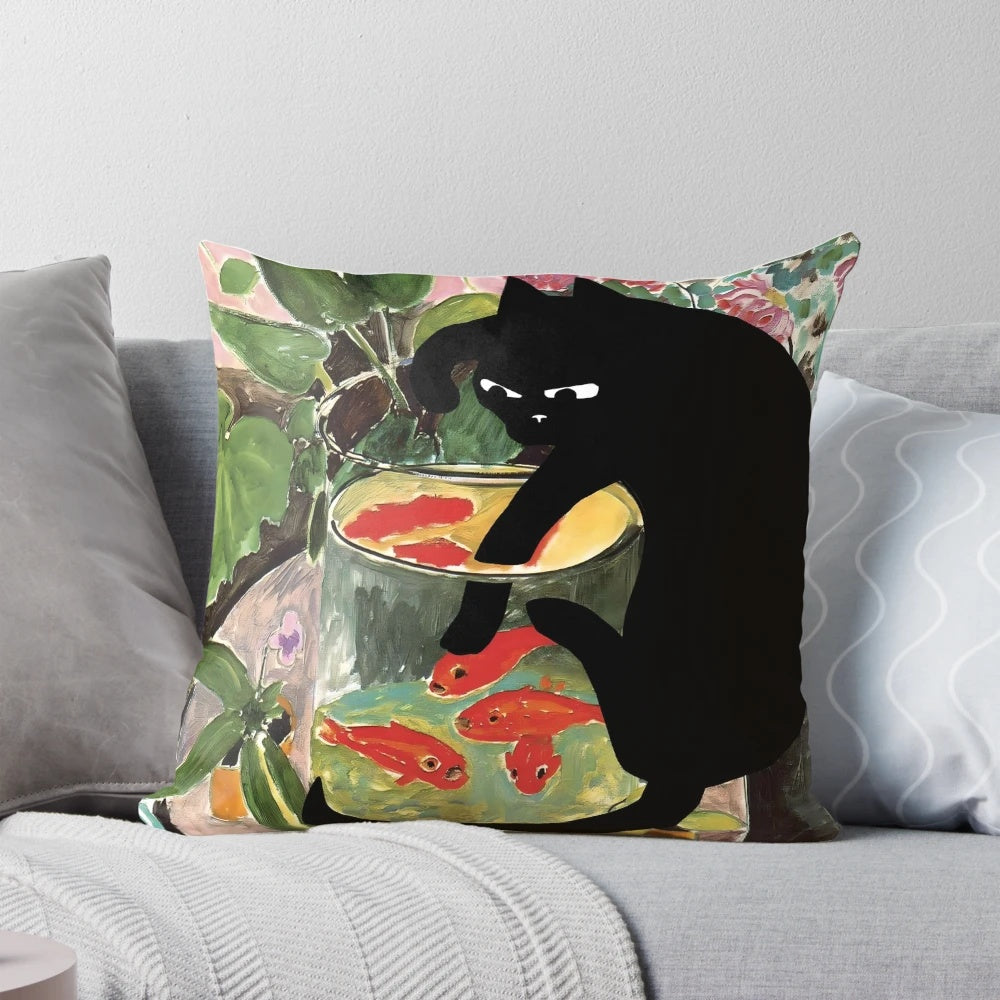Colorful decorative pillow featuring Matisse's famous painting of goldfish and a mischievous black cat