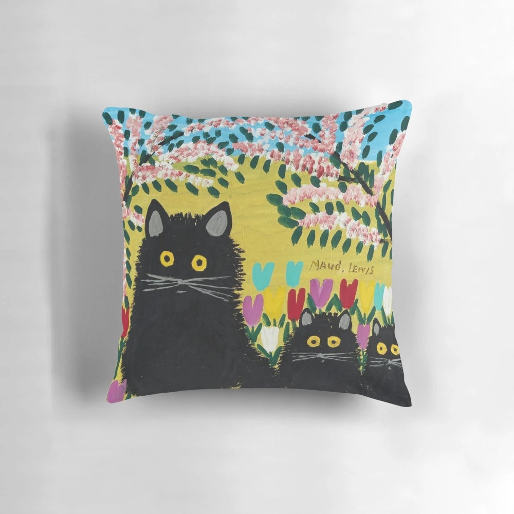 Maud Lewis inspired pillow featuring three black cats, a charming home decor piece for cat lovers.