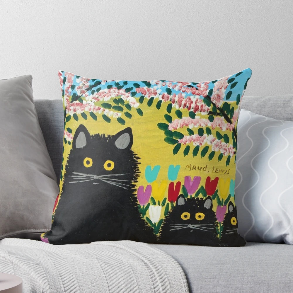 Maud Lewis inspired pillow featuring three black cats, a charming home decor piece for cat lovers.