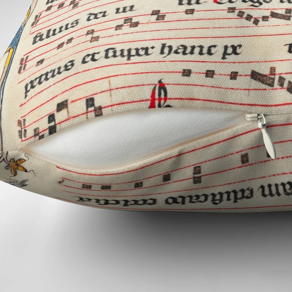 Decorative pillow featuring an image of a medieval antiphonary or musical manuscript used in Gregorian chant and Catholic liturgy.