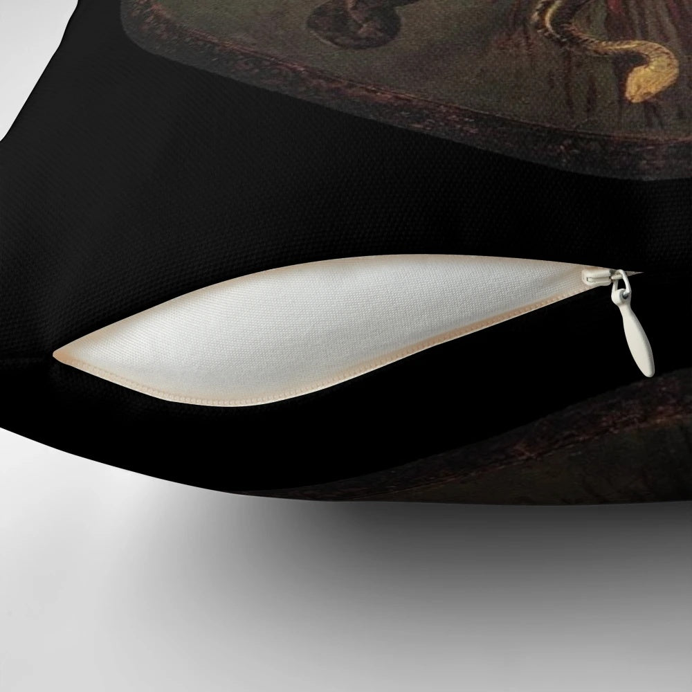 A decorative pillow featuring the iconic image of Medusa's head, inspired by the renowned Baroque painting by Caravaggio.