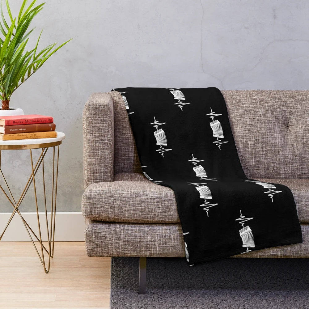 Accordion-patterned plush blanket