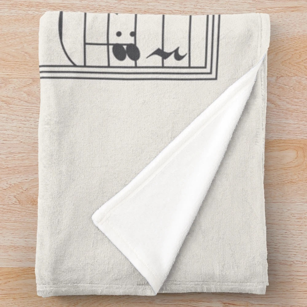 Plush black and white blanket with bird and music note design